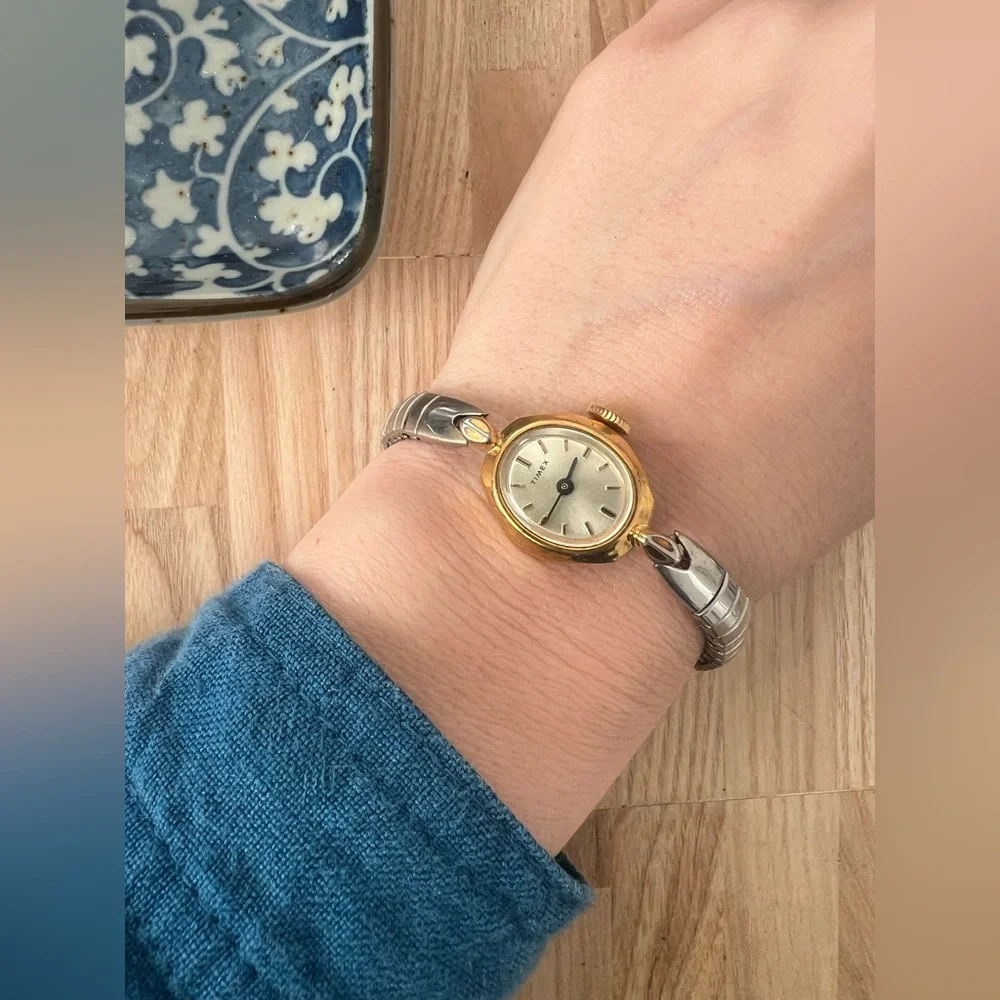Vintage Timex ladies oval two toned mechanical winding dress watch